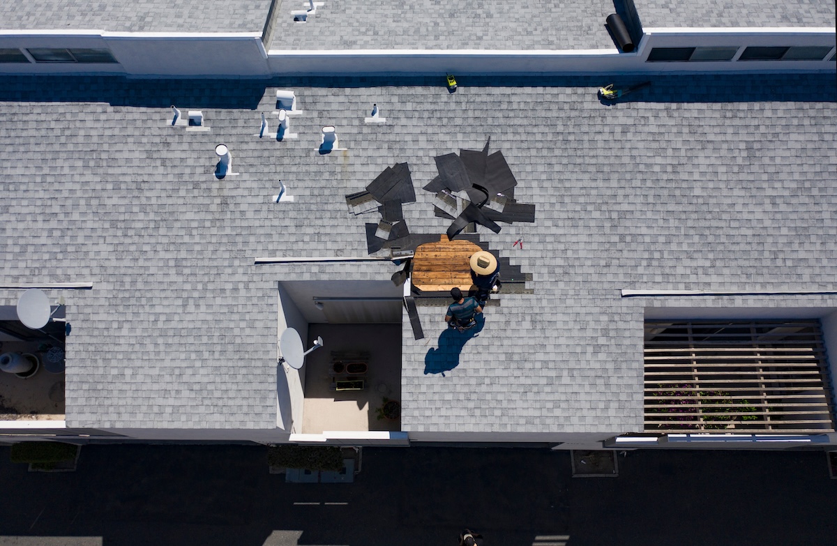 Roof Repair Inspection In Progress Aerial Above Head Condo Building Gray Shingles 2 Roofers