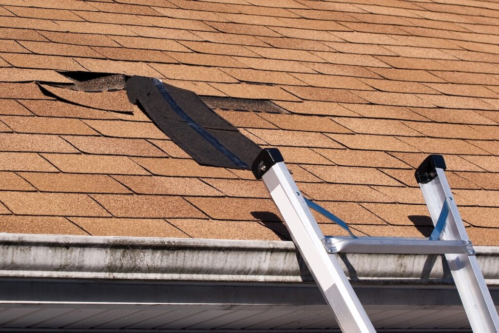 how to find a roof leak Fixing damaged roof shingles.  A section was blown off after a storm with high winds causing a potential leak.