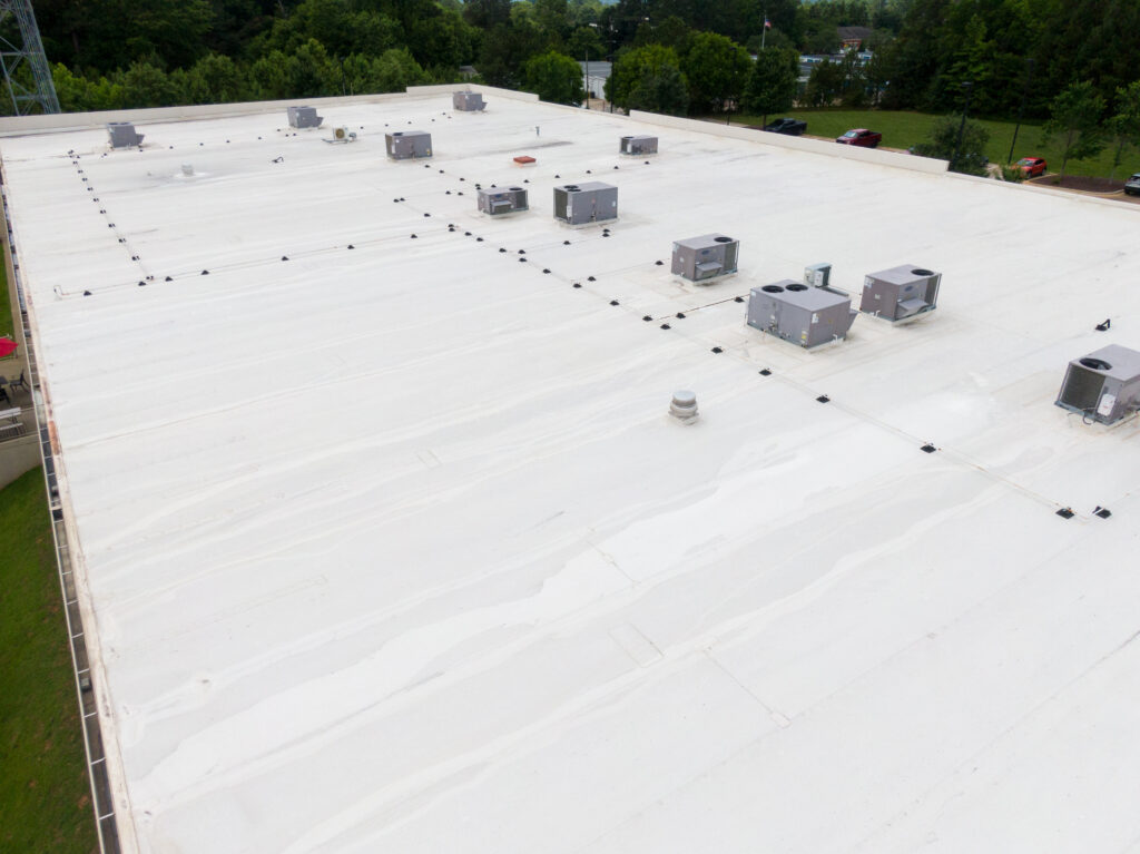 flat roof repair Drone Images of Flat Commercial TPO Roofs: Sunny, No People, Industrial