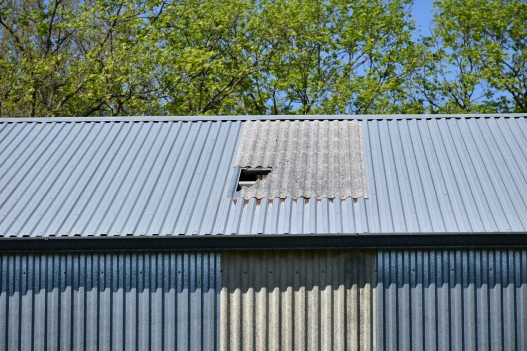 Roof hail damage metal roof hole