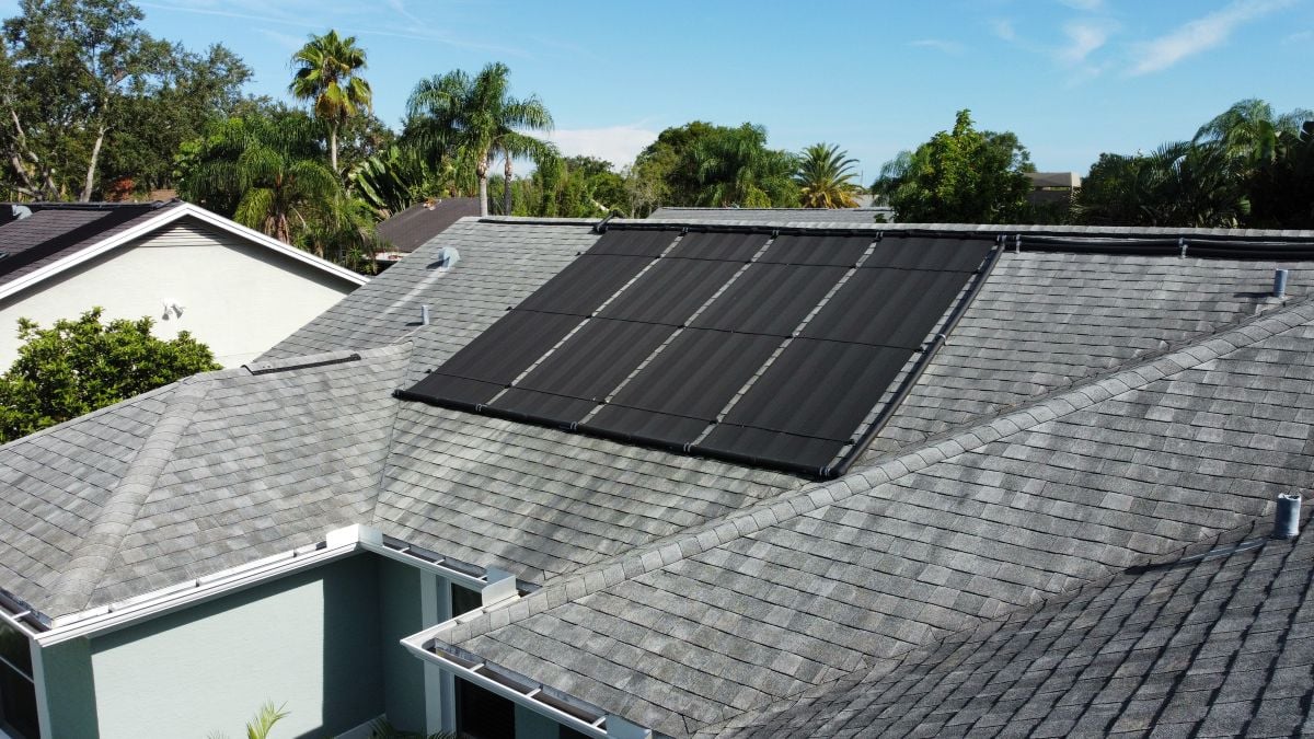 solar maintenance services charcoal shingles with panels on house