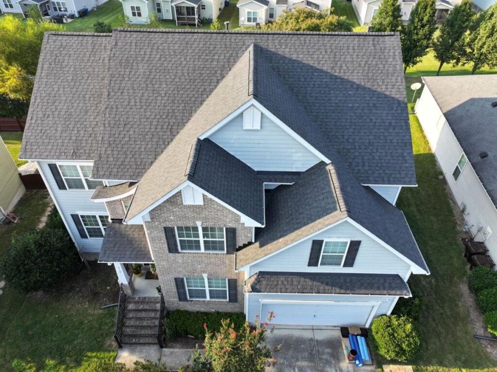 Dark grey shingle roof inspection