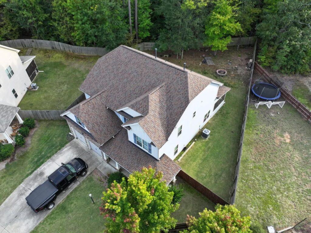 Tan asphalt shingles on a roof