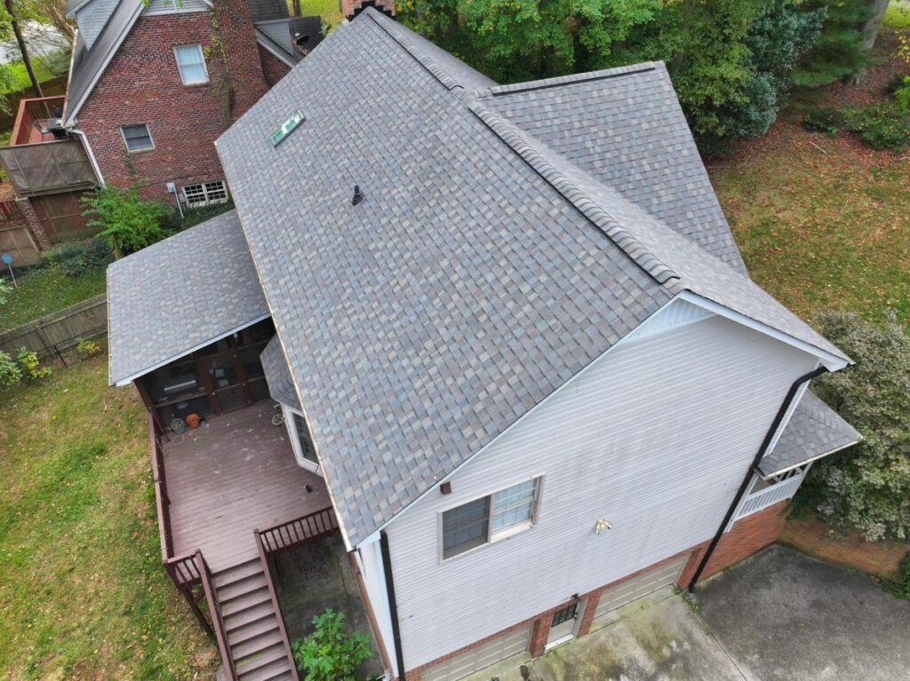 Light grey shingles on a pitched roof
