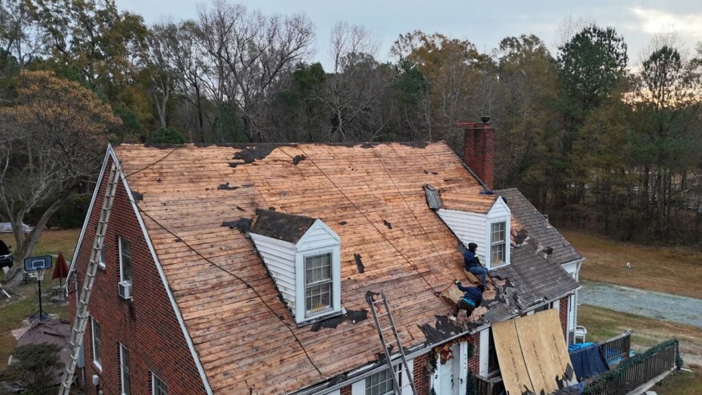 Barkley-Jensen team working on a roof