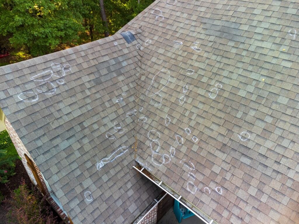 storm damage roof inspection hail damage holes after storm inspection