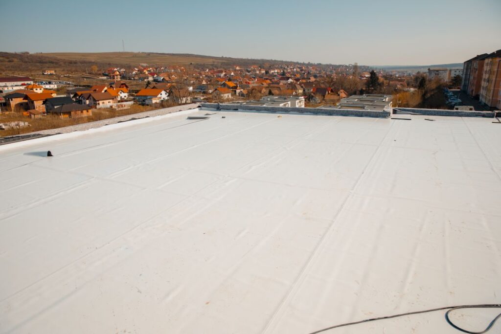 white commerical roof coating building
