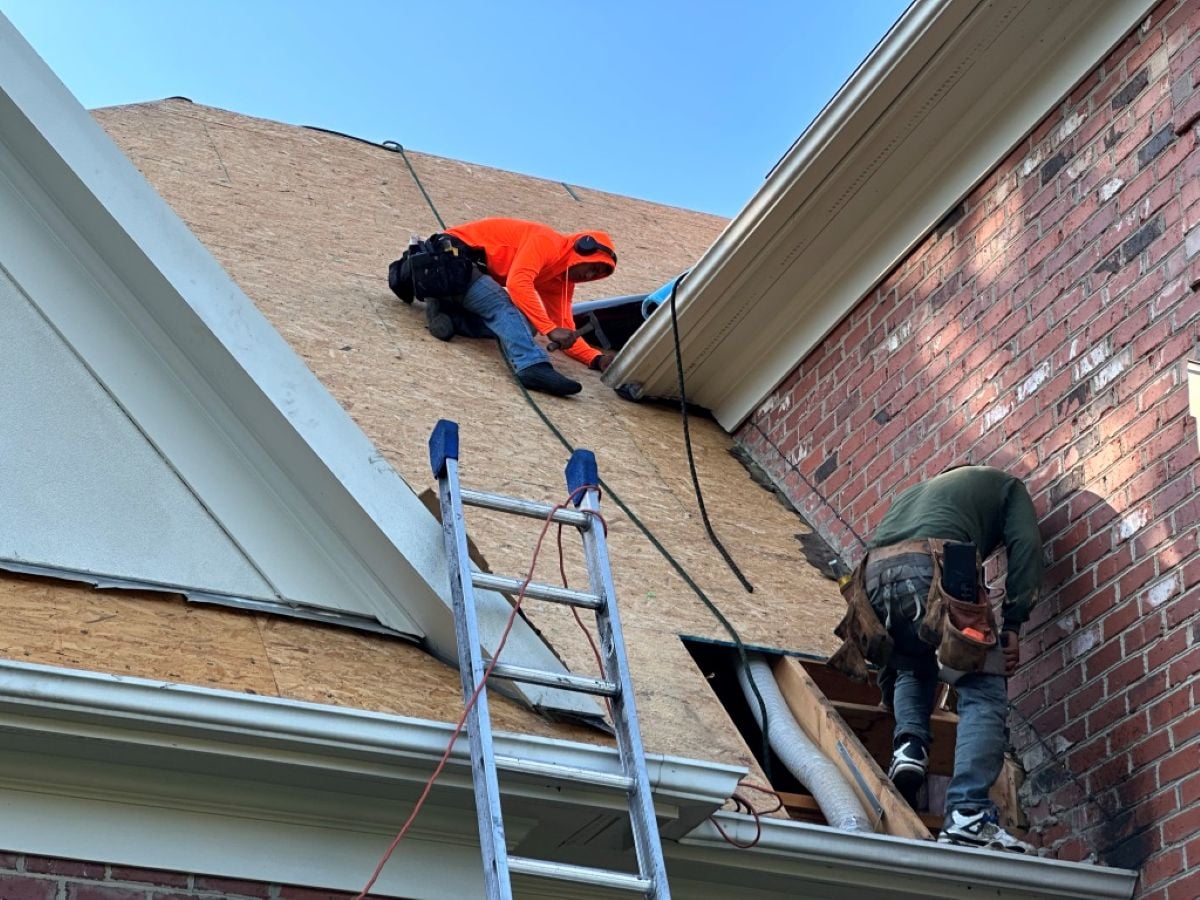 how long does a commercial roof replacement take in raleigh nc worker replacing shingles