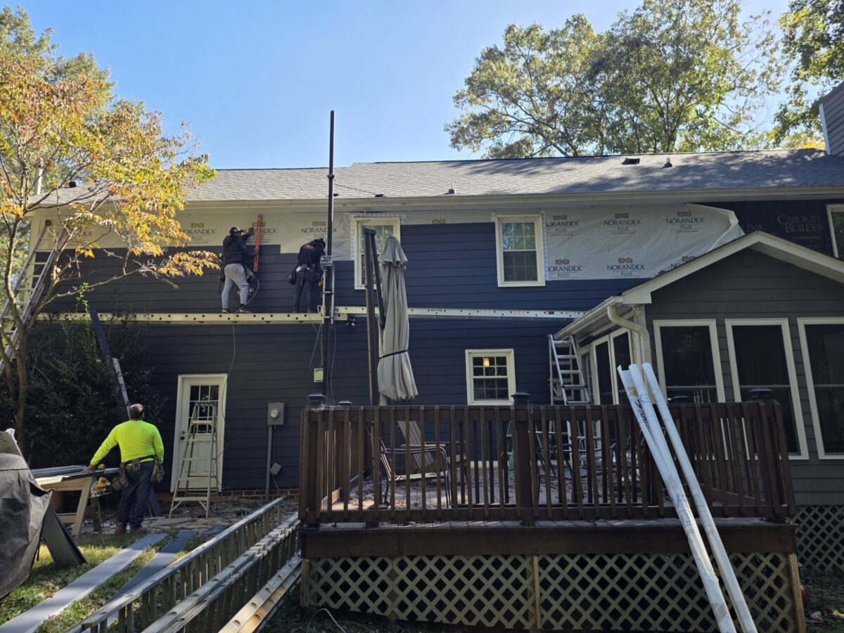 siding durham nc workers replacing damaged siding