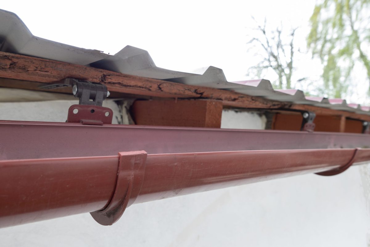gutters garner nc Gutter system for a metal roof. Holder gutter drainage system on the roof.