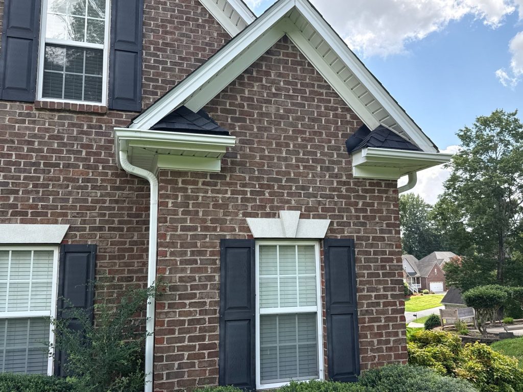 gutters garner nc brick wall white frame windows